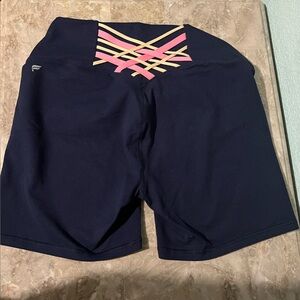Fabletics Powerhold High-Waisted Workout Shorts, navy 6”, large